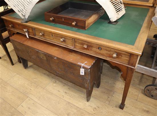 A mahogany partners desk, fitted six drawers, on tapered legs and spade feet W.167.5cm, D.106cm
